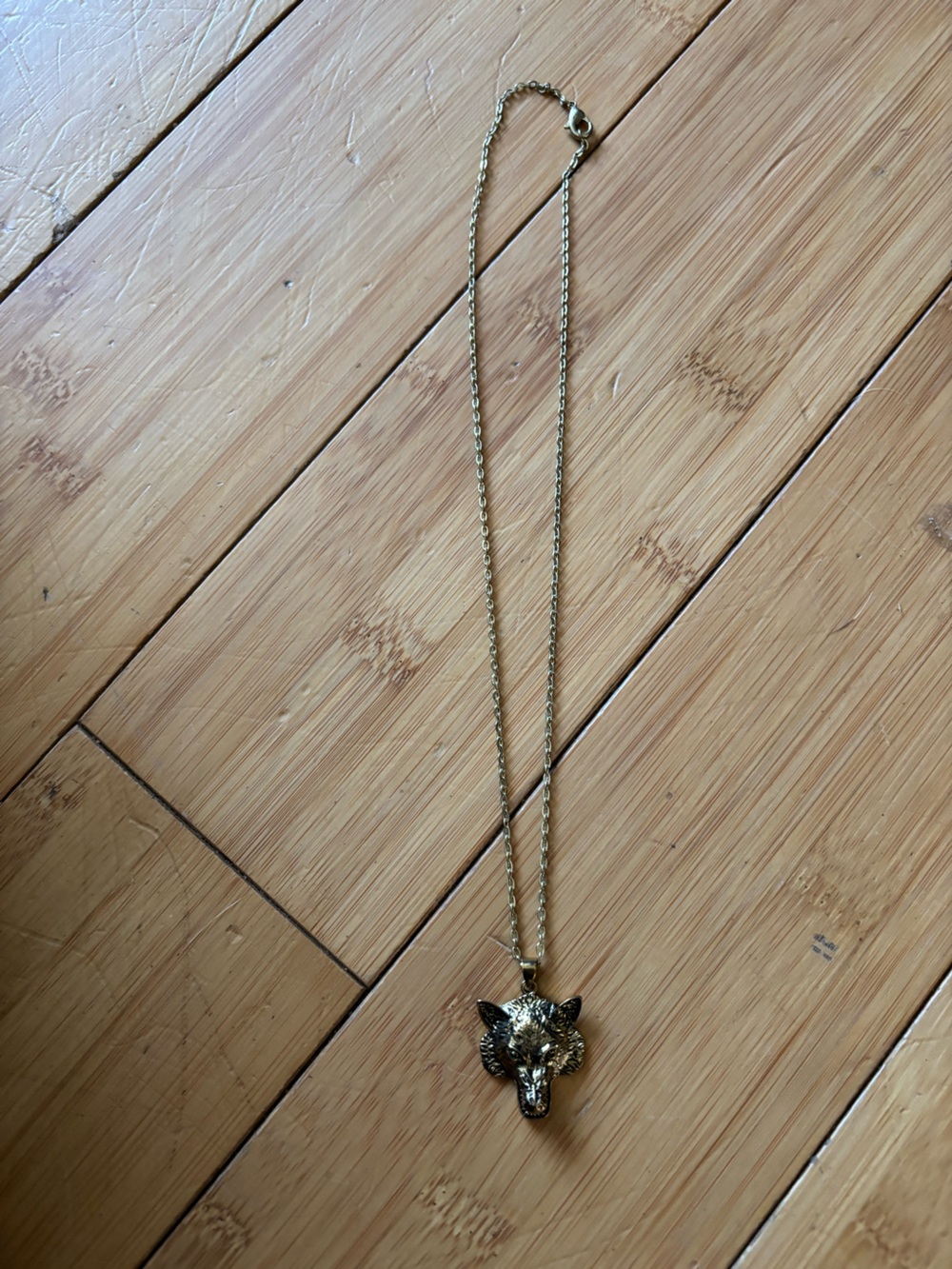 Gold tone Wolf Head Pendant Necklace.